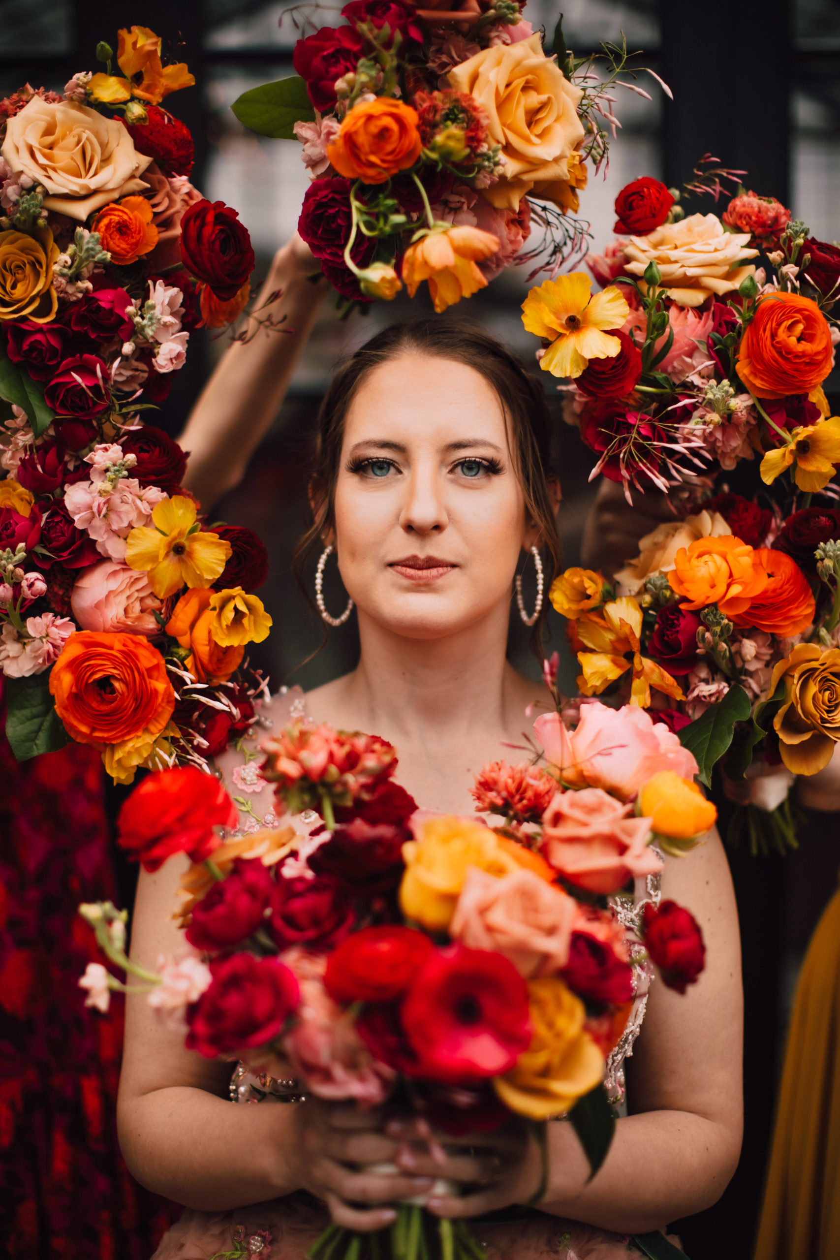 A bride surrounded by flowers
